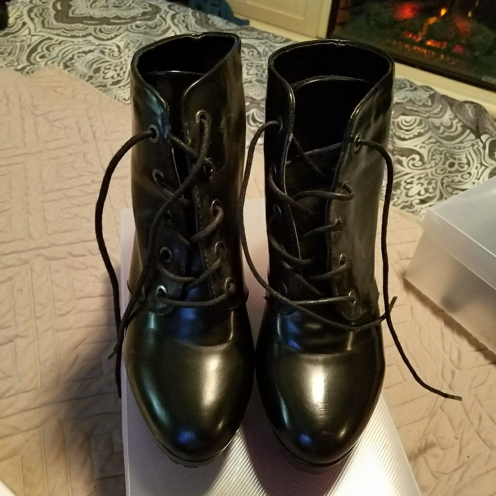 Shiny black booties